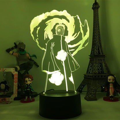 <img src="obito-madara-mode.jpg" alt="Obito Uchiha LED nightlight lamp in Madara mode, featuring Obito in Akatsuki cloak with swirling Mangekyou Sharingan effect. Perfect for anime fans of Naruto Shippuden, this unique lamp adds a mystical touch to any room. Ideal gift for fans of Madara Uchiha, Naruto decor, and Japanese anime collectibles.">