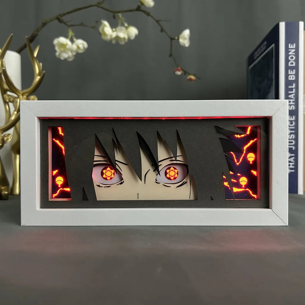 <img src="sasuke.jpg" alt="Sasuke Uchiha LED art frame showcasing his intense gaze with the Mangekyou Sharingan activated. The vivid red lightning effects and dark background add dramatic energy, perfect for anime enthusiasts and collectors of Naruto-themed decor. This illuminated Sasuke frame is an eye-catching piece for fans of Naruto Shippuden, ideal for enhancing an anime-inspired room setup. High-quality Sasuke Uchiha merchandise for anime art lovers, making a unique gift for Naruto series fans.">