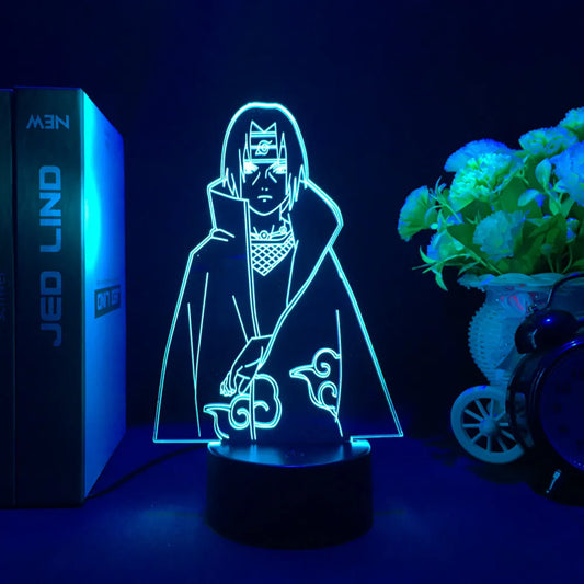 <img src="LED lamp featuring an outline illustration of Itachi Uchiha from Naruto and Naruto Shippuden during his time with the Akatsuki. He is depicted wearing the iconic Akatsuki cloak with a serious expression, pointing forward. The warm orange light highlights his headband and cloak, capturing his intense presence as a member of the Akatsuki.">