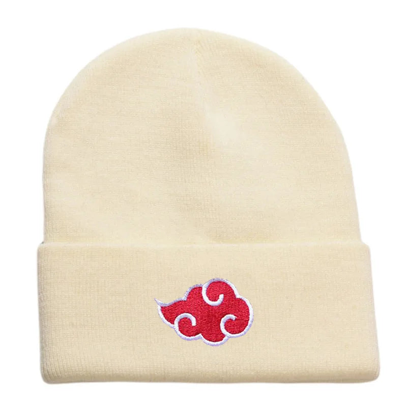 <img src="akatsuki-cream-knitted-hat.jpg" alt="Cream Akatsuki beanie with iconic red and white Akatsuki cloud logo from Naruto and Naruto Shippuden. This unisex Naruto knit hat is a high-quality winter accessory for anime fans, ideal for Naruto cosplay and Akatsuki enthusiasts. Made from durable, comfortable materials, this one-size-fits-all beanie is perfect for showcasing your anime love while staying warm. A must-have Naruto Shippuden accessory for any anime collector or Naruto fan.">