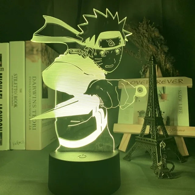 <img src="nightlight-naruto-kunai.jpg" alt="3D LED lamp of Naruto holding a kunai, perfect for manga and anime fans. This unique lamp emits a purple glow, highlighting the iconic details of Naruto Uzumaki in a combat stance. Ideal for bedroom decor, this Naruto lamp makes a must-have gift for fans of the ninja universe. Geek-inspired decor from the Naruto anime series, bringing an immersive atmosphere for fans.">